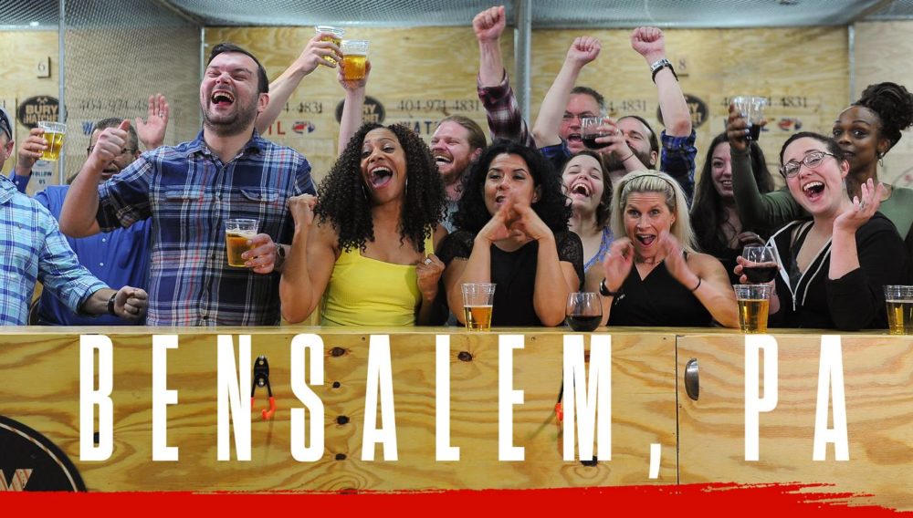 Bury The Hatchet Bensalem PA City Page Header Image. Axe throwers celebrating with hands in air